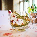 Photography of Bovey-Castle-Wedding-flower bowl with white and pink orchids