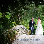 Bovey Castle wedding couple on the bridge in the gardens