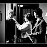 Bestman and groom at Hotel Endsleigh Wedding, pinning on button hole