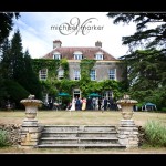 Somerset wedding venue Holbrook House with bride and guests on the terrace