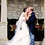 Kissing couple at Bovey Castle wedding in Devon