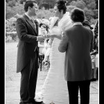 Bride and groom exchanging vows at Pentillie Castle wedding in Cornwall