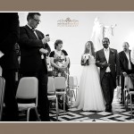 Bride and father of bride entering hall way for wedding ceremony at Syon Park in London