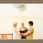 Bride and groom exchanging vows at Blackpool Sands near Dartmouth wedding ceremony