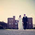 Wedding couple in front of Mount Edgecumbe House in Cornwall