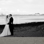 Mount Edgecumbe wedding kiss on the beach overlooking Plymouth