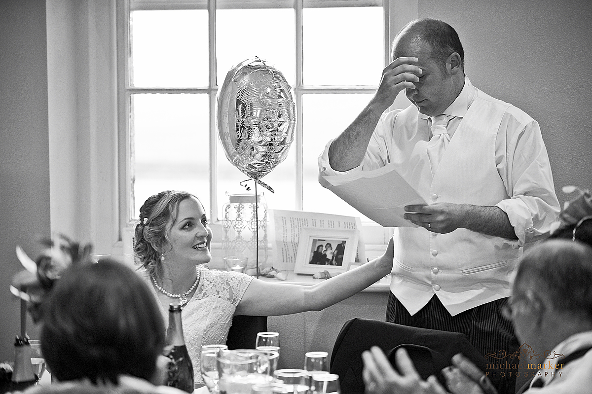 Emotional Falmouth wedding speech by groom with smiling bride