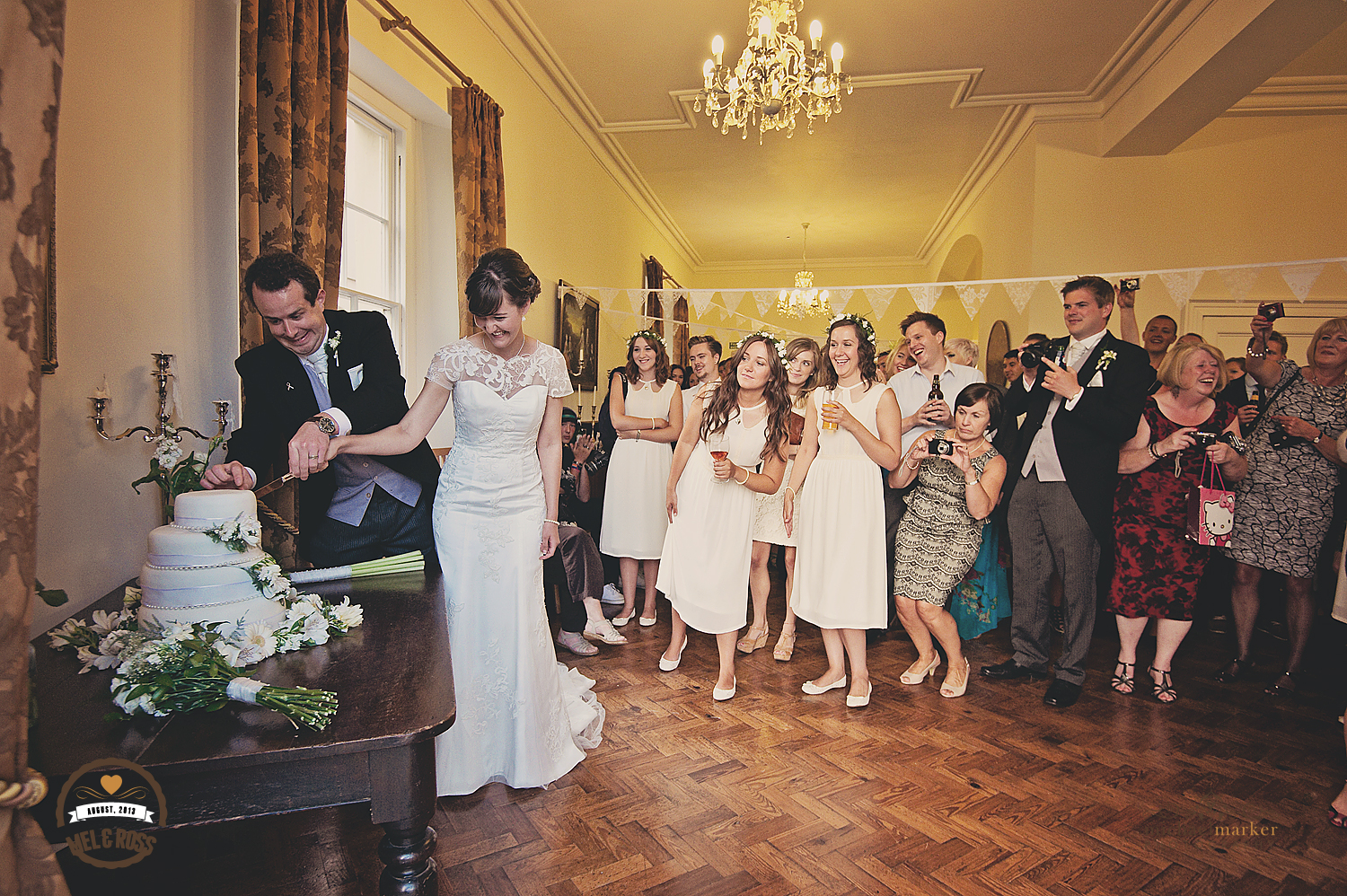 Cutting the cake at North Devon wedding 