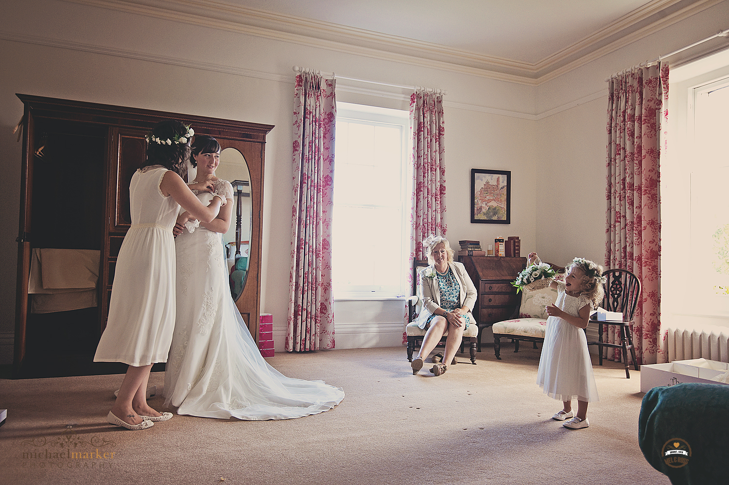 Flower girl and bride at devon wedding