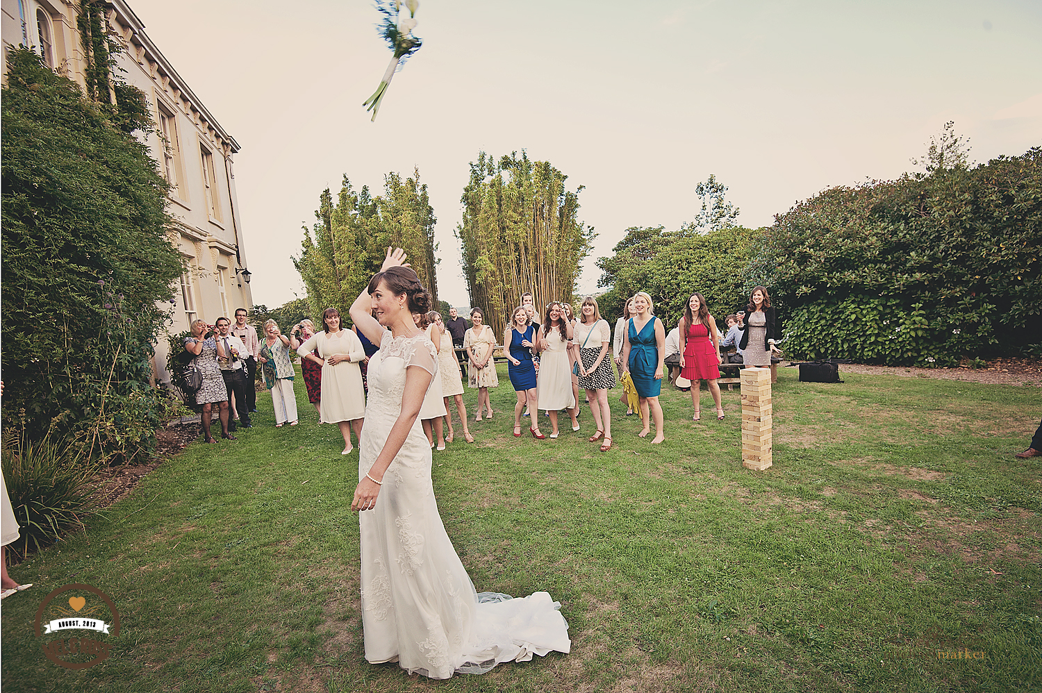 Bride throwing the bouquet at North Devon wedding