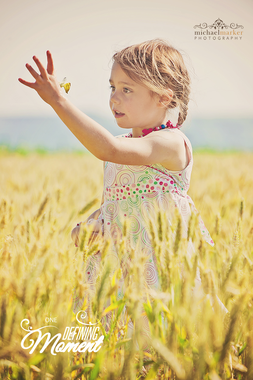 Devon portrait photographer - girl catching a butterfly