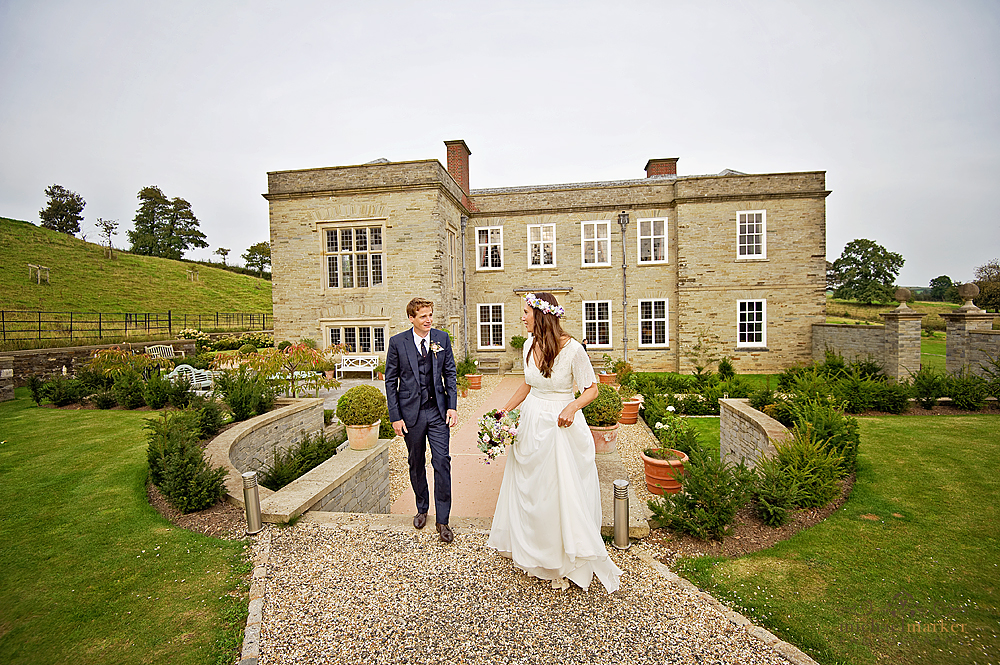 Bride-and-groom-in-front-of-Shilstone-House