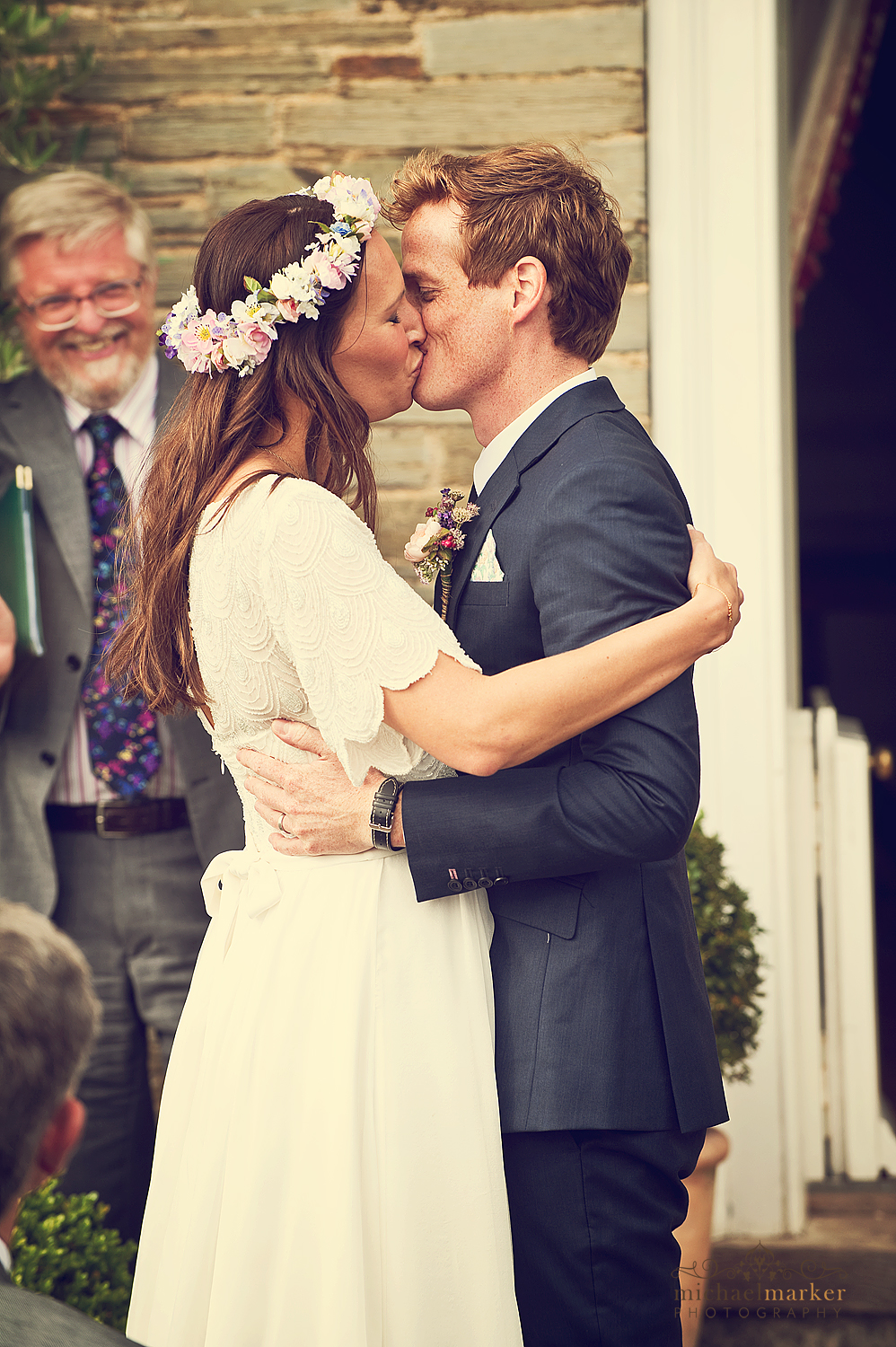 Bride and groom kiss at Shilstone House wedding ceremony