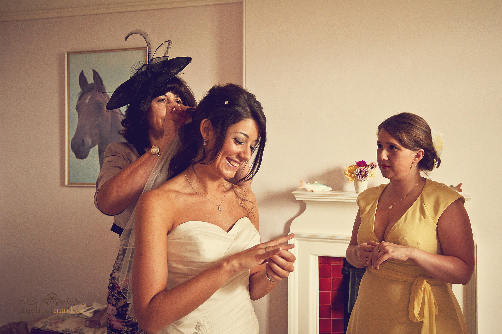 Bride-putting-on-veil