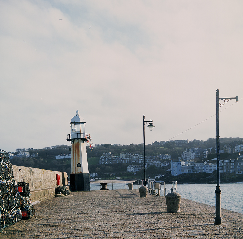 View of lighthouse at entrance to St Ives harbour in Cornwall