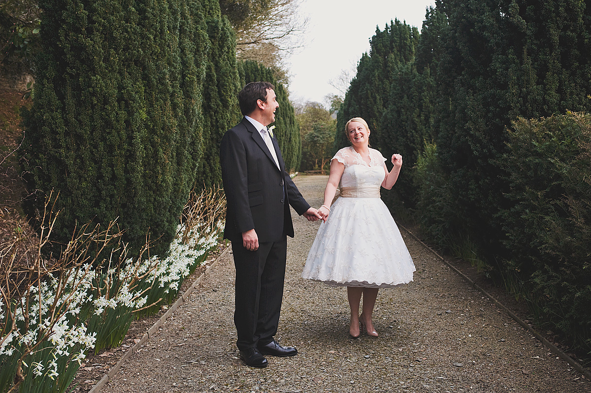 Vintage bride and groom in walk at Hotel Endsleigh