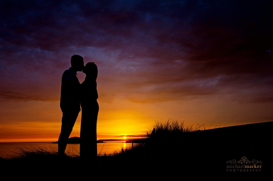 Bigbury engagement kiss in devon