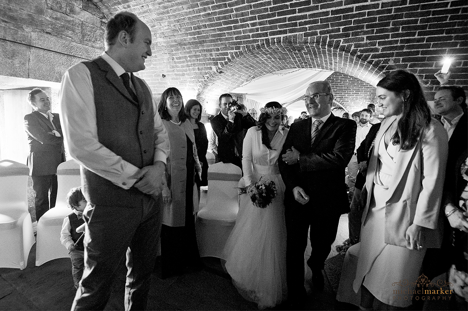 bride and groom's first look at Polhawn fort wedding in Cornwall