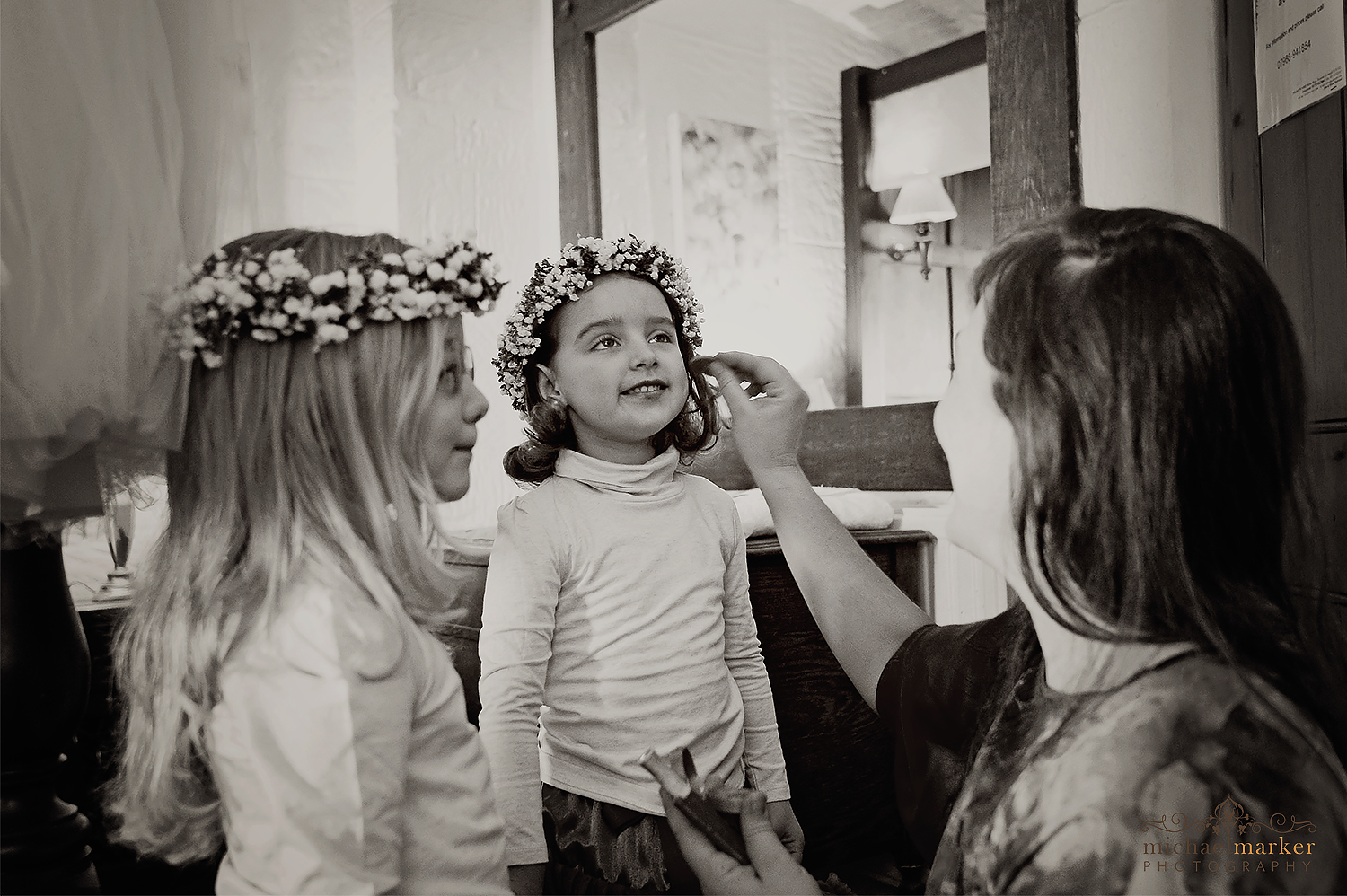 Flower girls getting ready for Cornish wedding