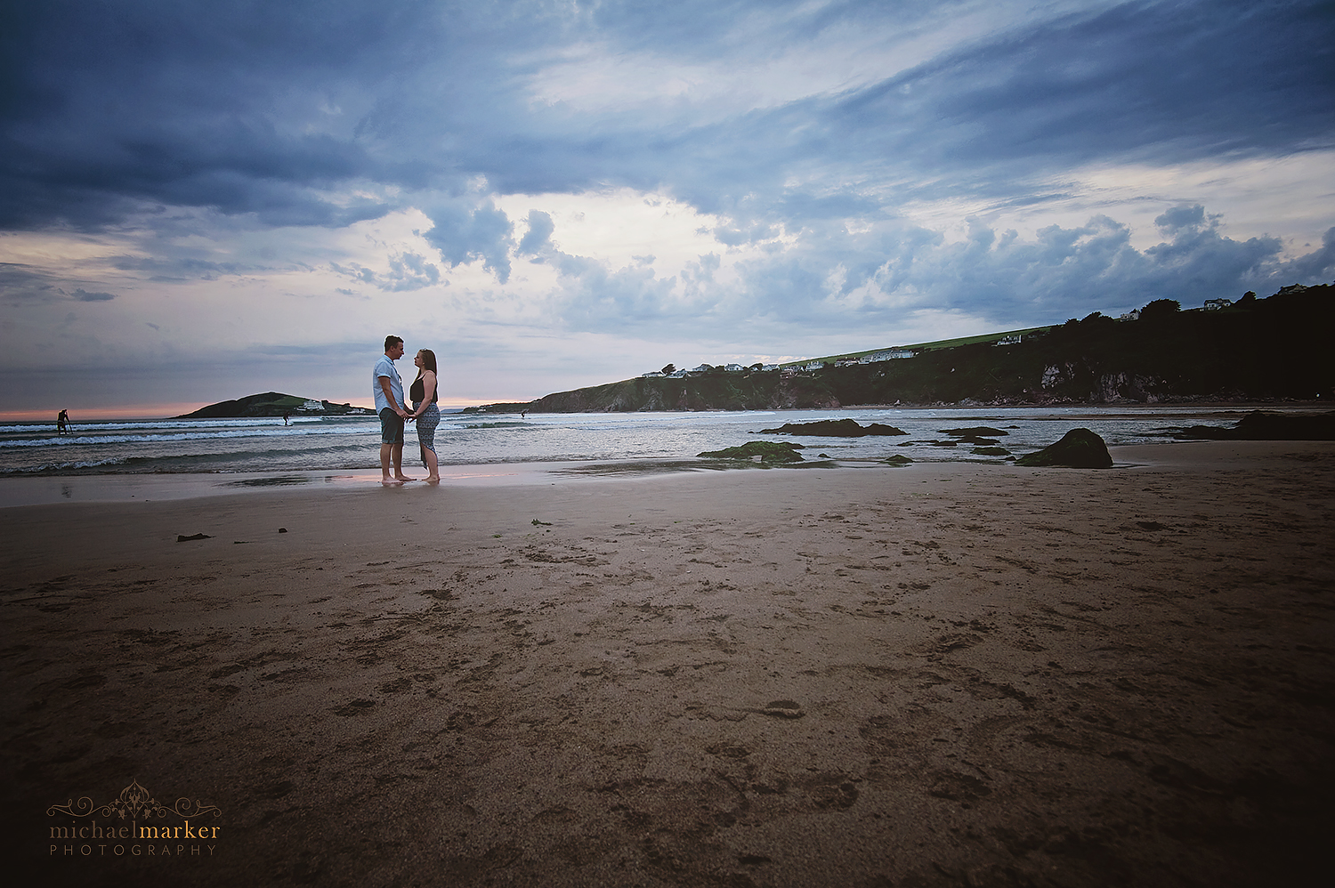 loving-engaged-couple-at-bigbury-beach