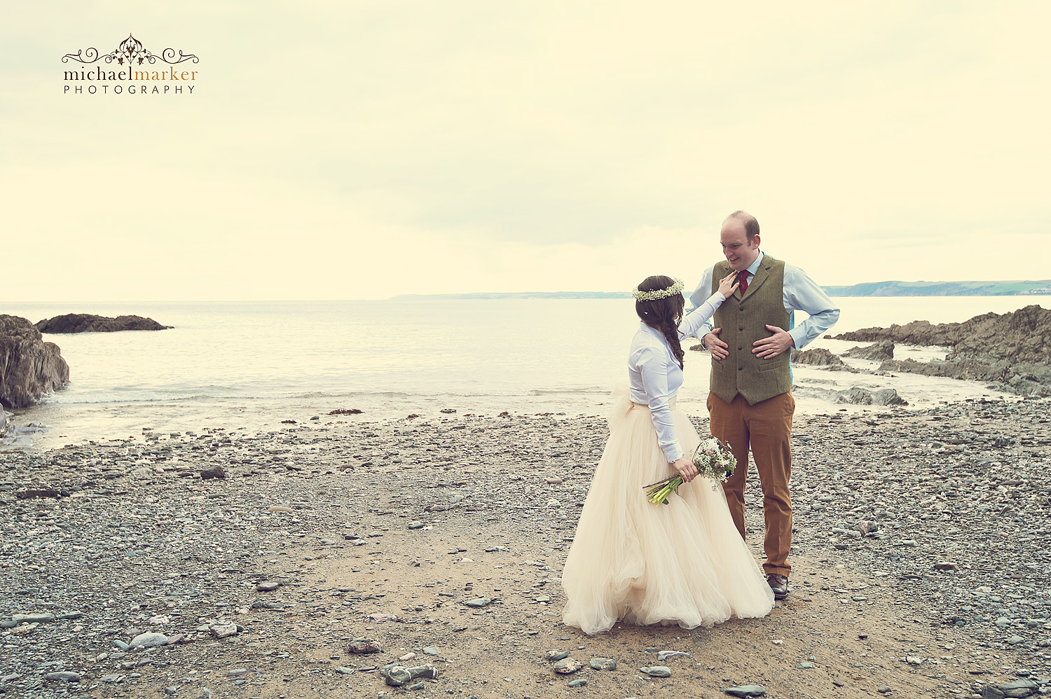 polhawn-beach-wedding-couple-sunset