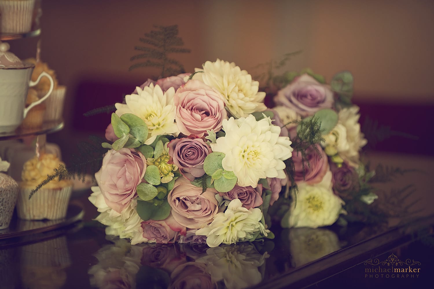 wedding bouquet of flowers on a grand piano.