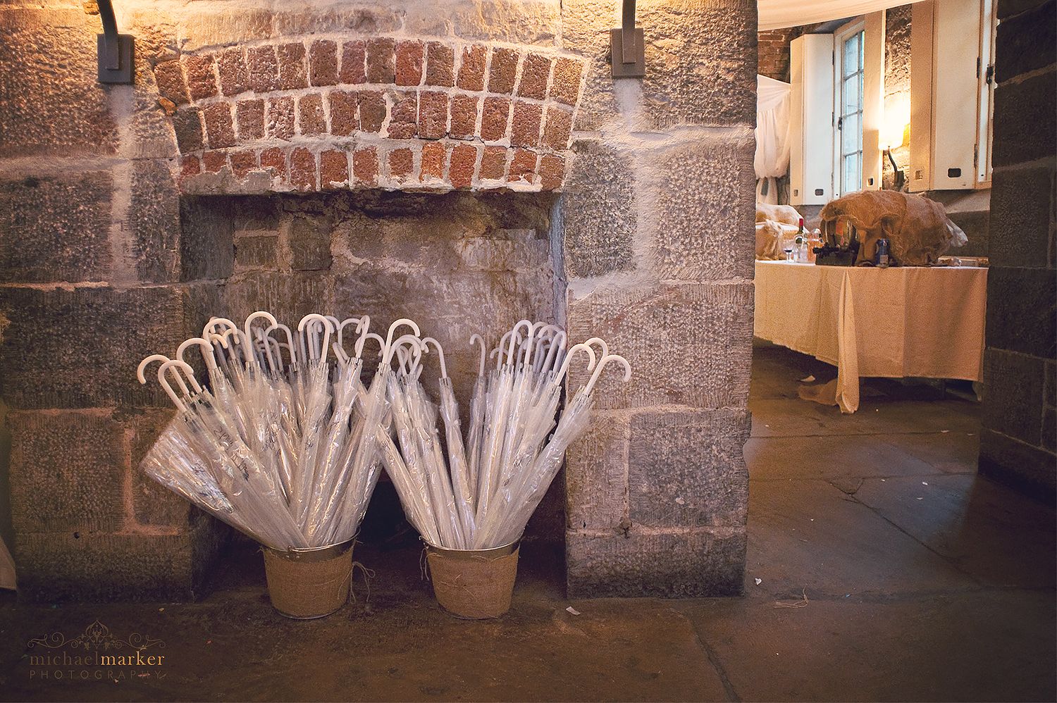 wedding day unbrellasin buckets at Polhawn Fort