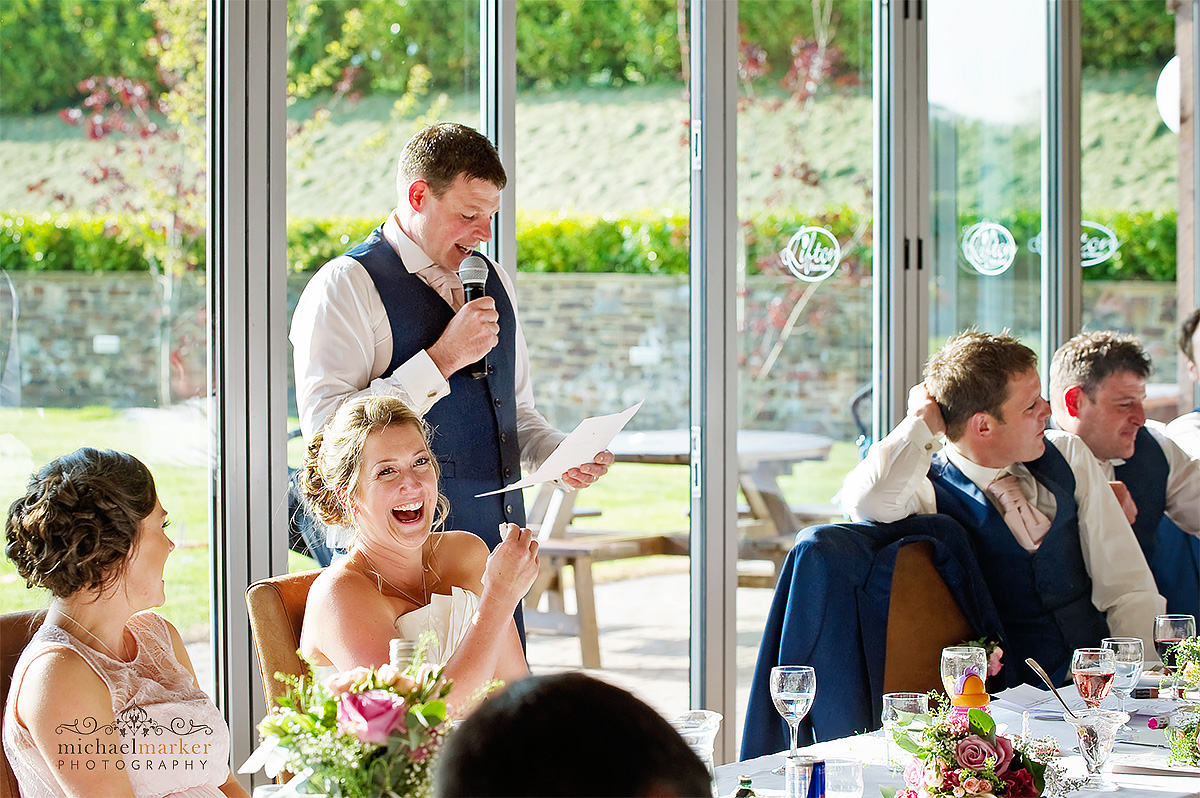 Luaghter during wedding reception speeches