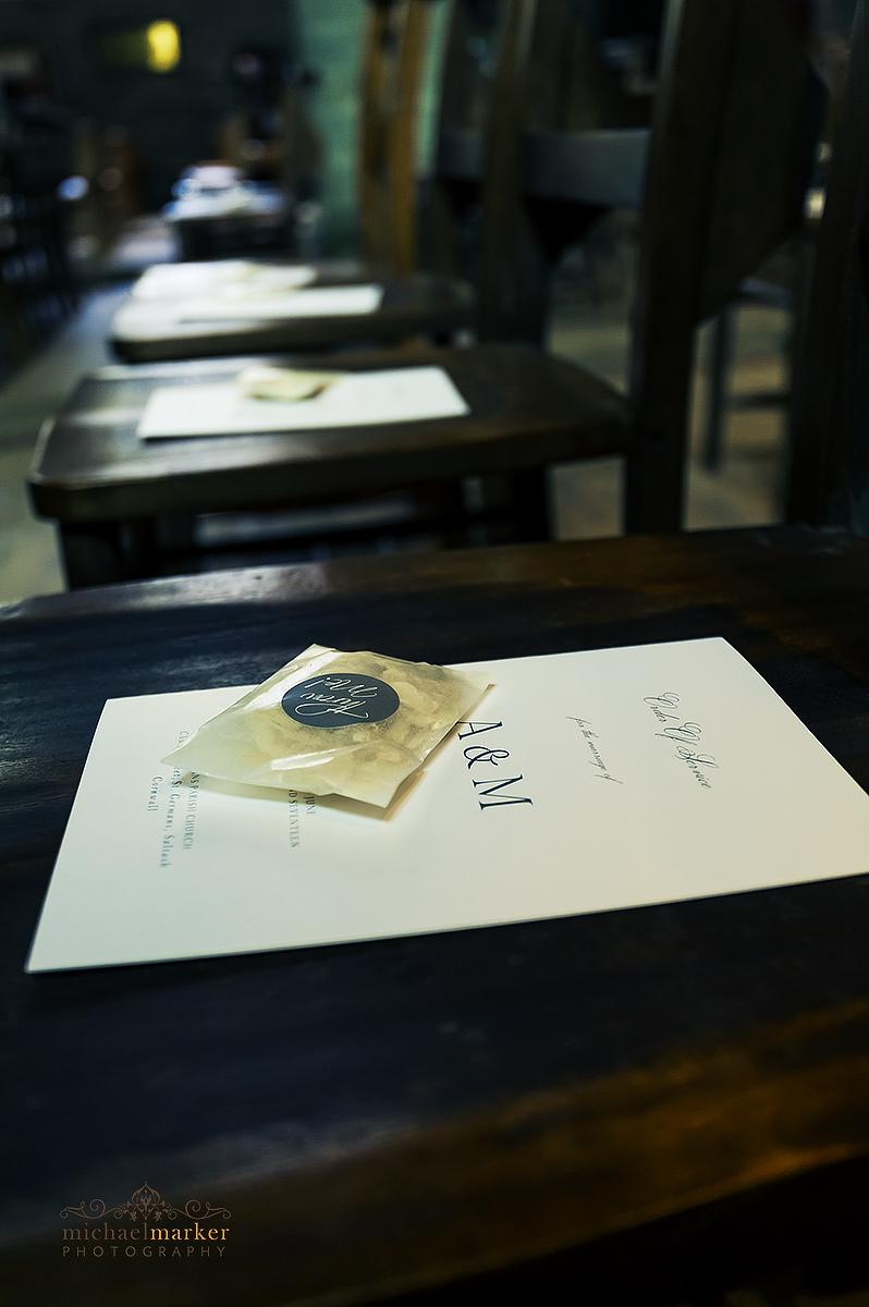 Wedding order of services on seats in St Germans Church interior