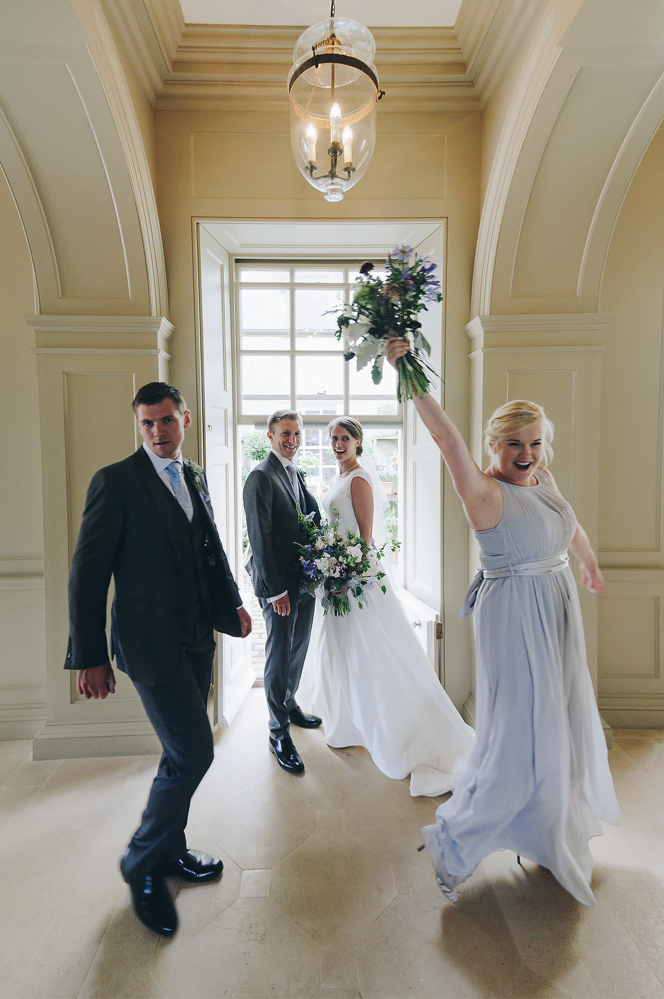 Shilstone weddign bride and groom photo is photobombed by bridesmaid and partner.