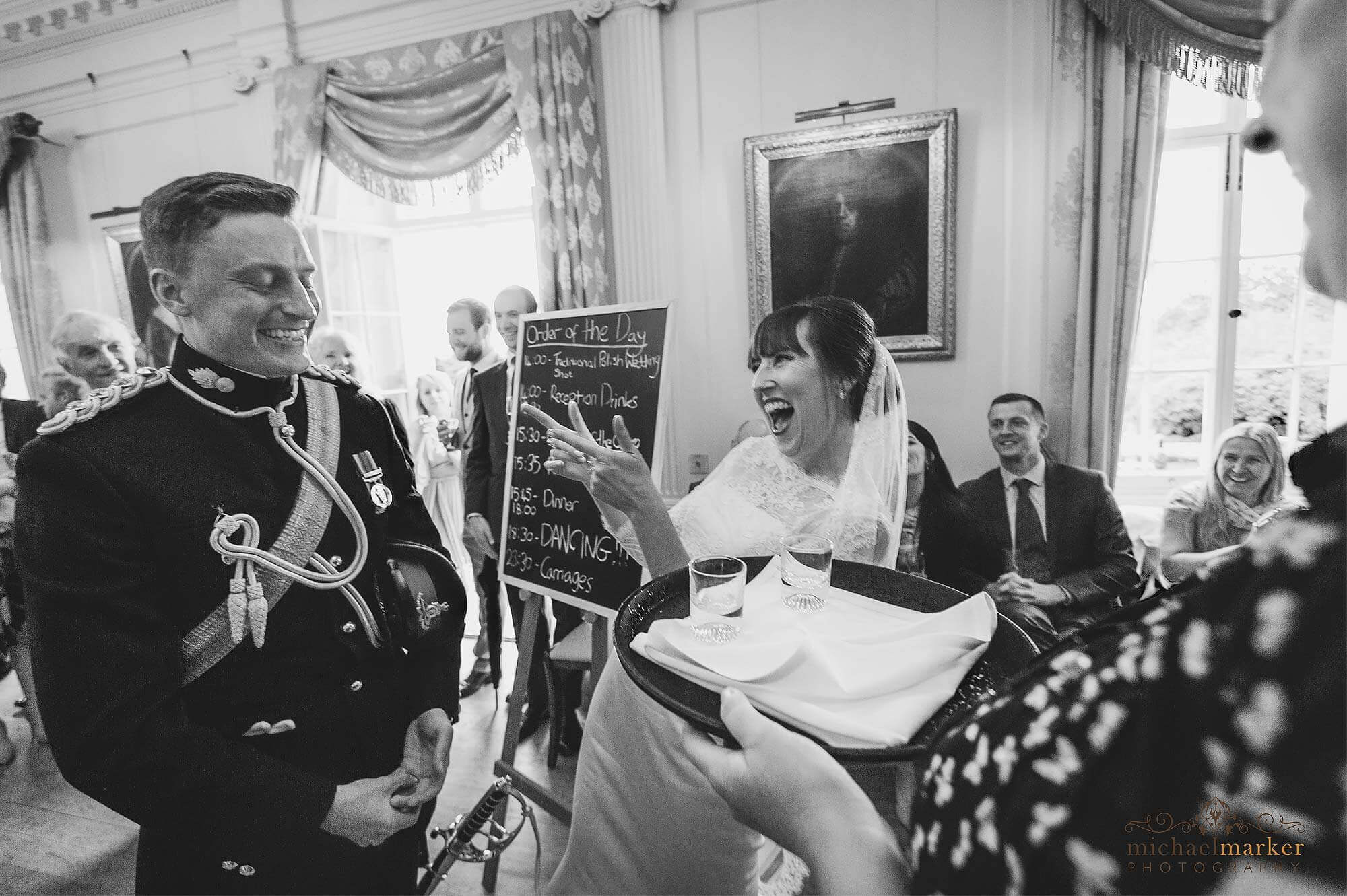 Bride wins a wedding day drinking challenge at Pentillie Castle in Cornwall.