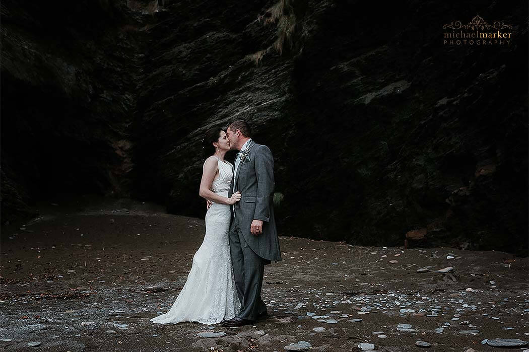 north devon beach wedding kiss