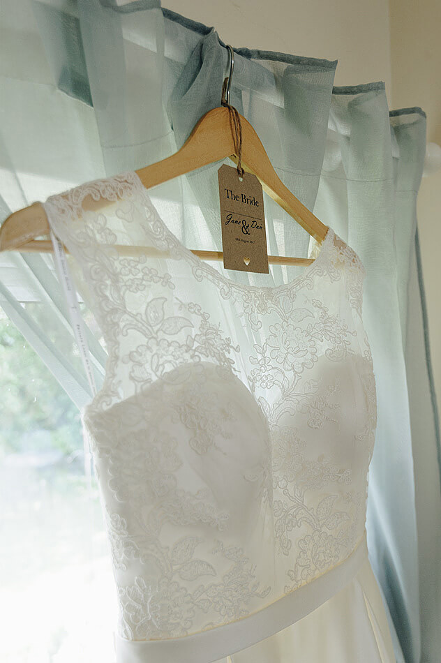 Clsoe up of lace top of wedding dress in devon