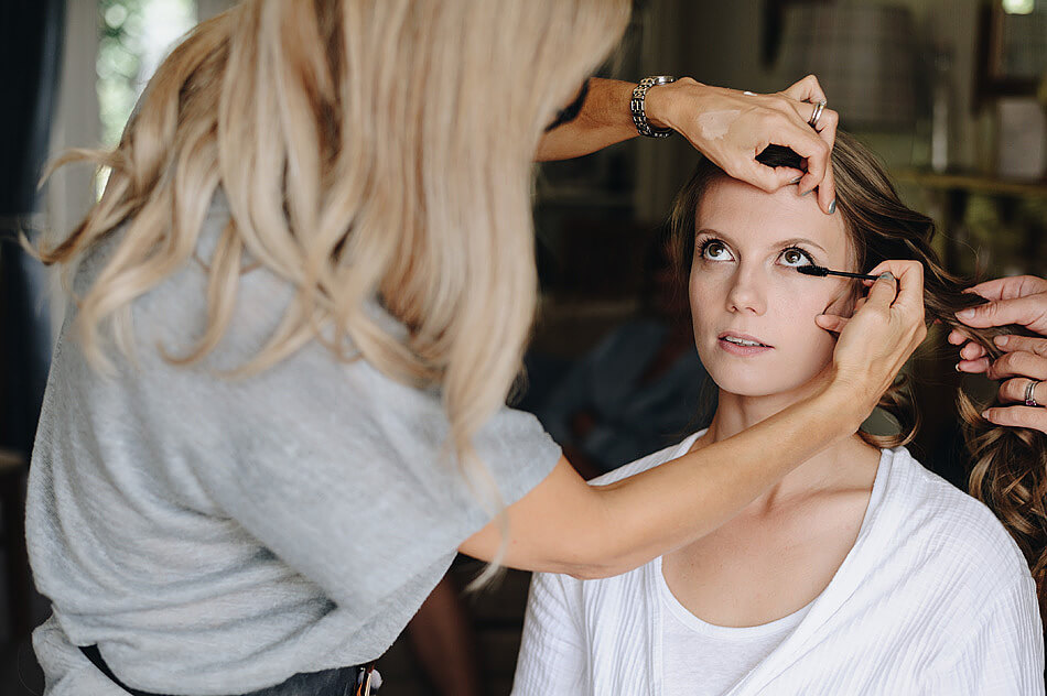 bride having mascara applied