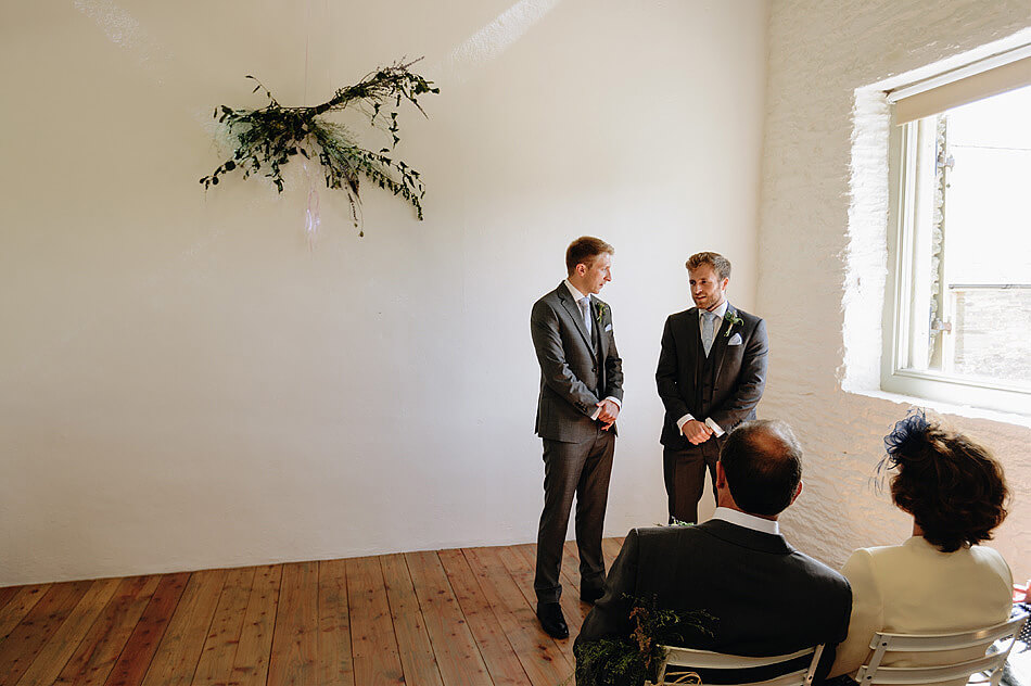 Groom and bestman waiting for the bride at Shilstone House in Devon