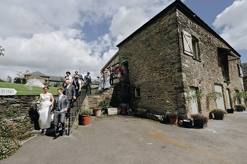 Bridal party and guests leaving the Shilstone House wedding ceremony