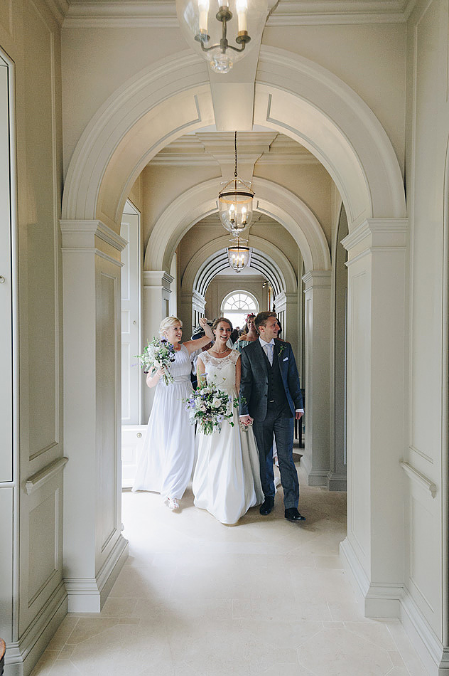 Bridal party in the corridor at Shilstone House wedding venue in Devon