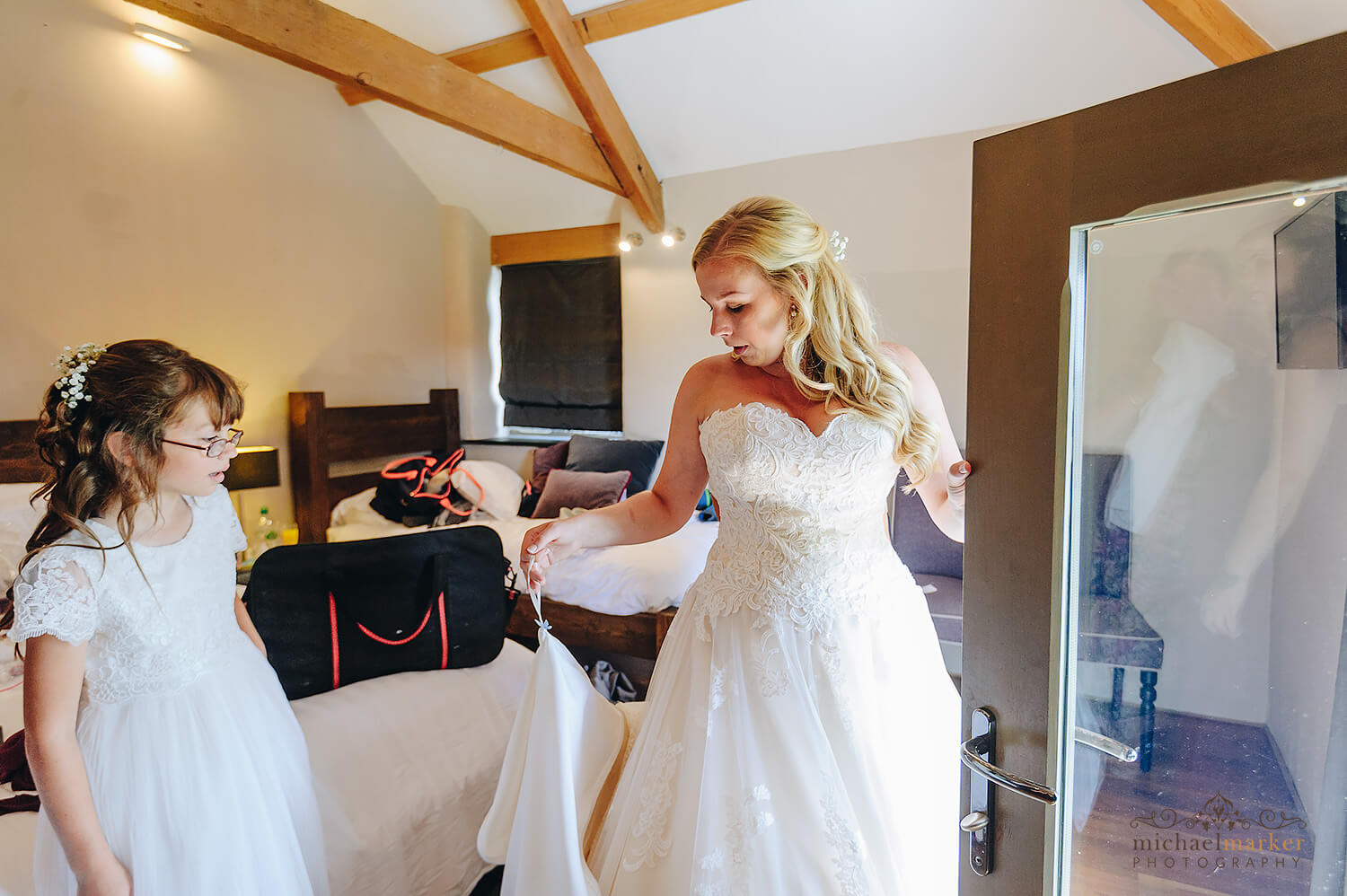 Beautiful bride and flowergirl getting ready at Trevenna wedding